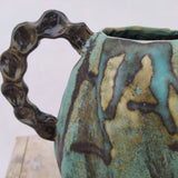 Vase METEORITE OBLONGUE En grès émaillé Cotes : 18,5 cm de haut et 24 cm de large